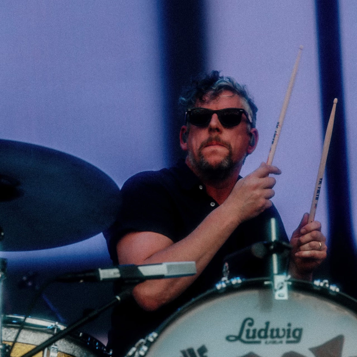 Patrick Carney, owner and founder of DYTS, playing drums during a The Black Keys concert